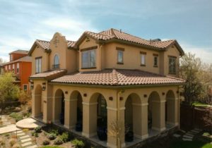 Aerial photo of Tan painted stucco home