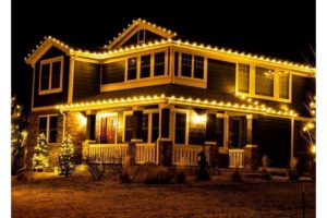 Photo of professional holiday lights on a roofline by kind home solutions