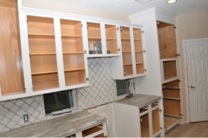 a photo of cabinets with the doors and drawers removed