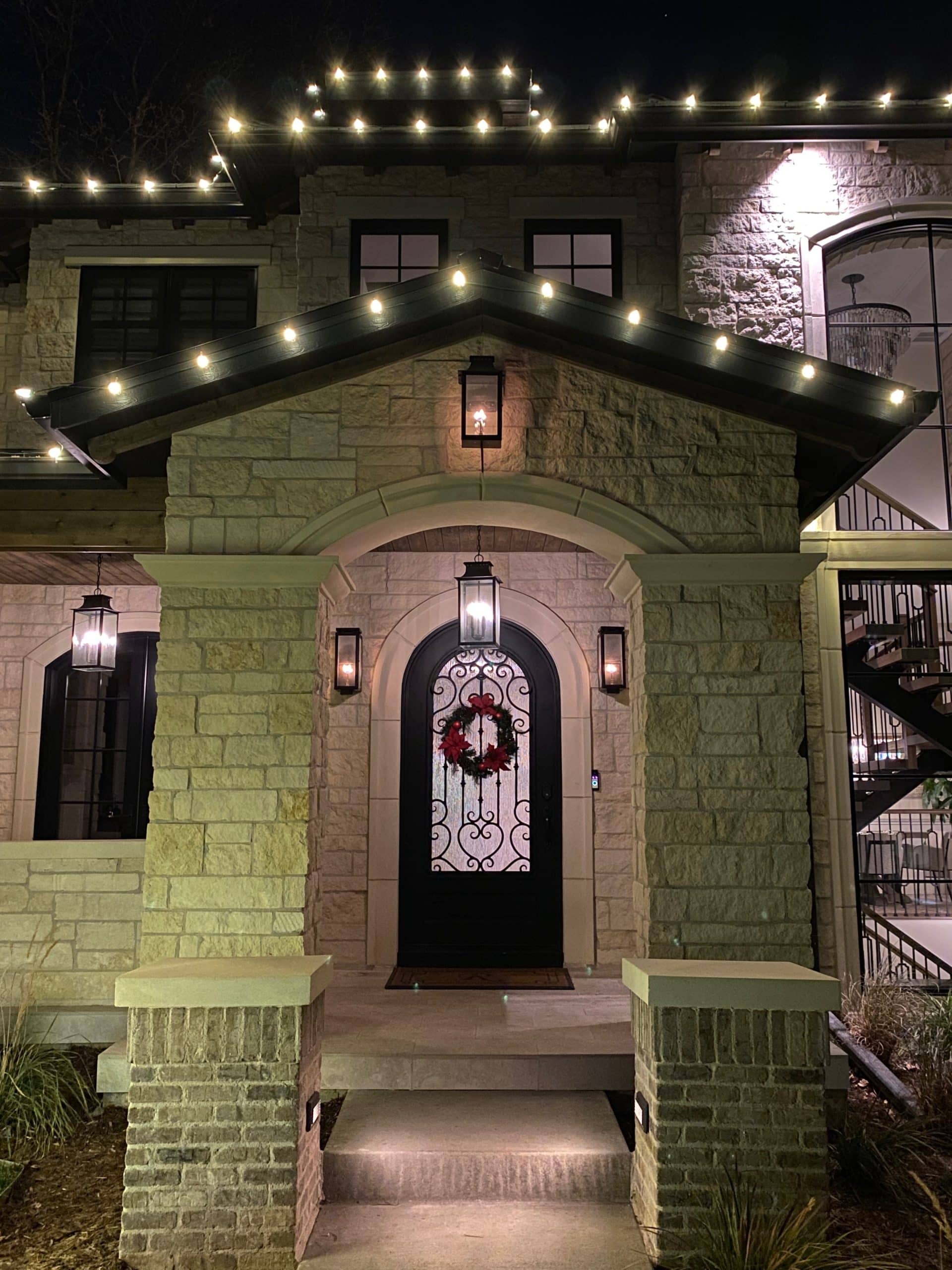 Photo of a home with professional holiday lights.