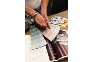 photo of a color consultant using a color wheel